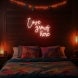Love Grows Here Neon Sign